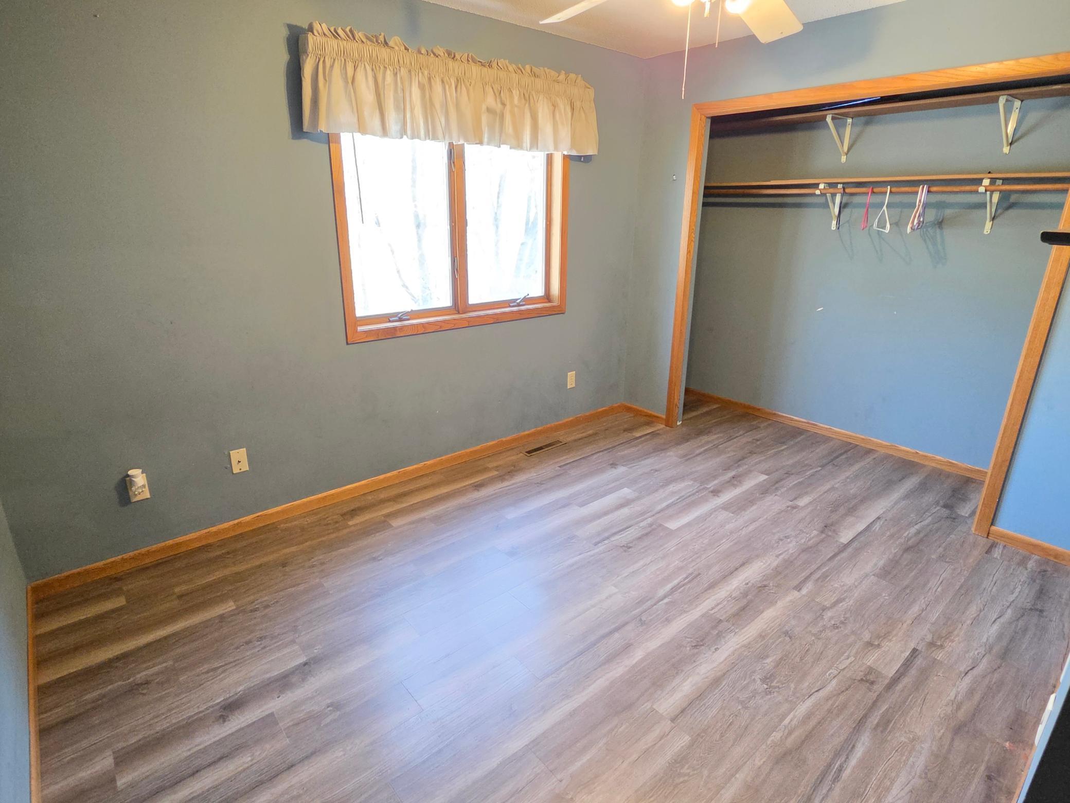 Upstairs 3rd bedroom with new flooring