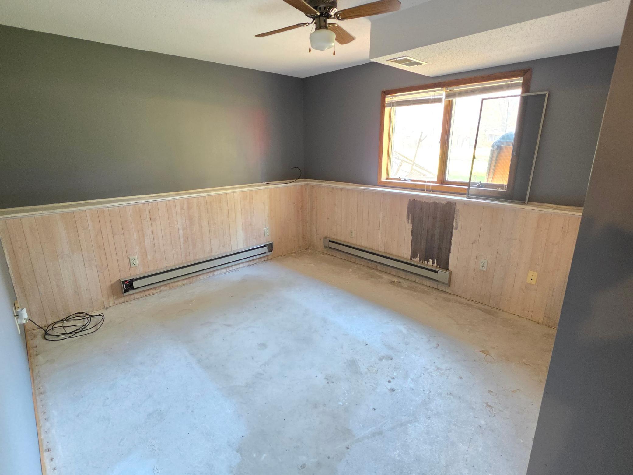 Lower Level 4th bedroom. Flooring has been removed, but not yet redone.