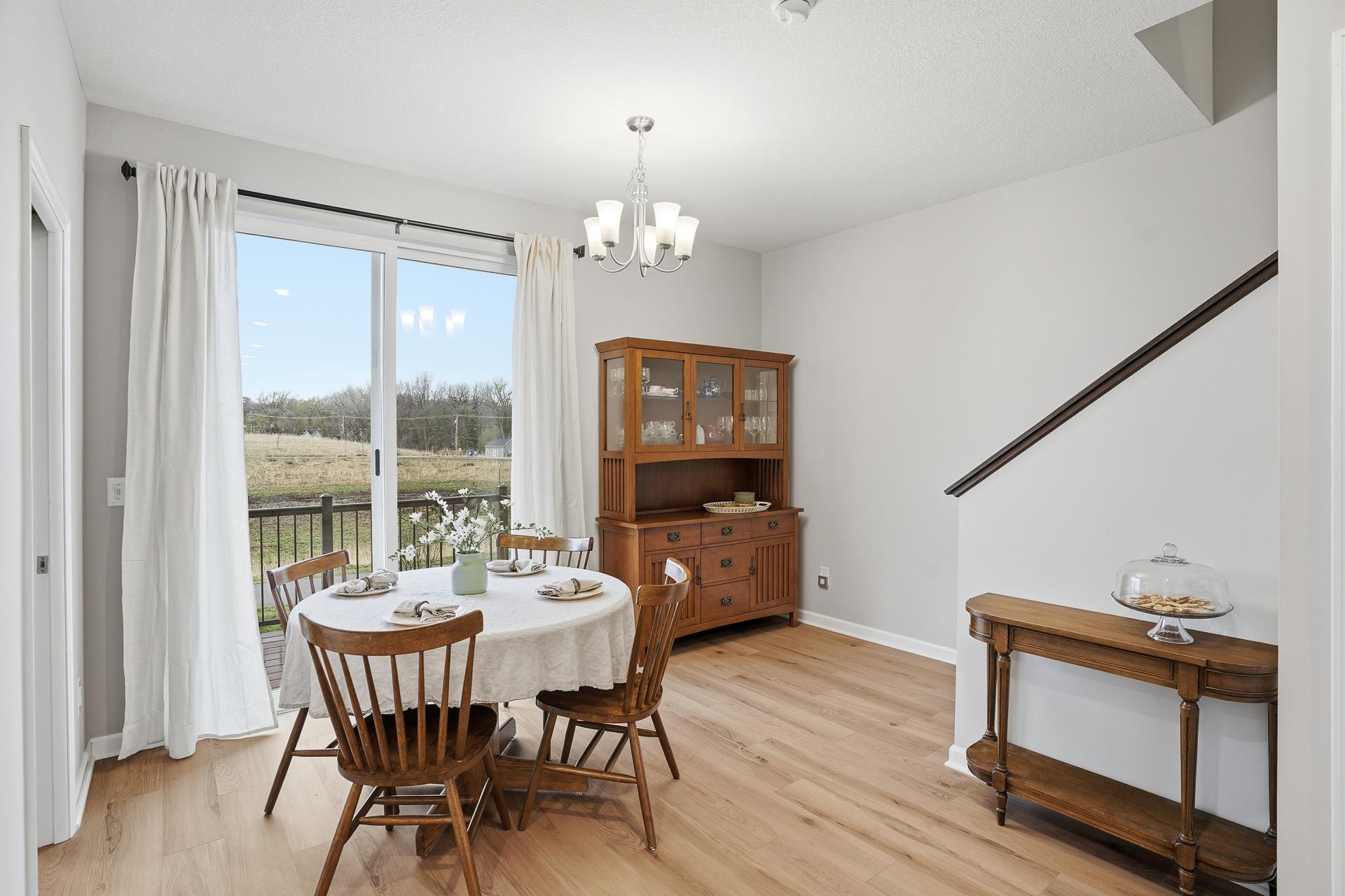 A cozy dining area with access to the deck