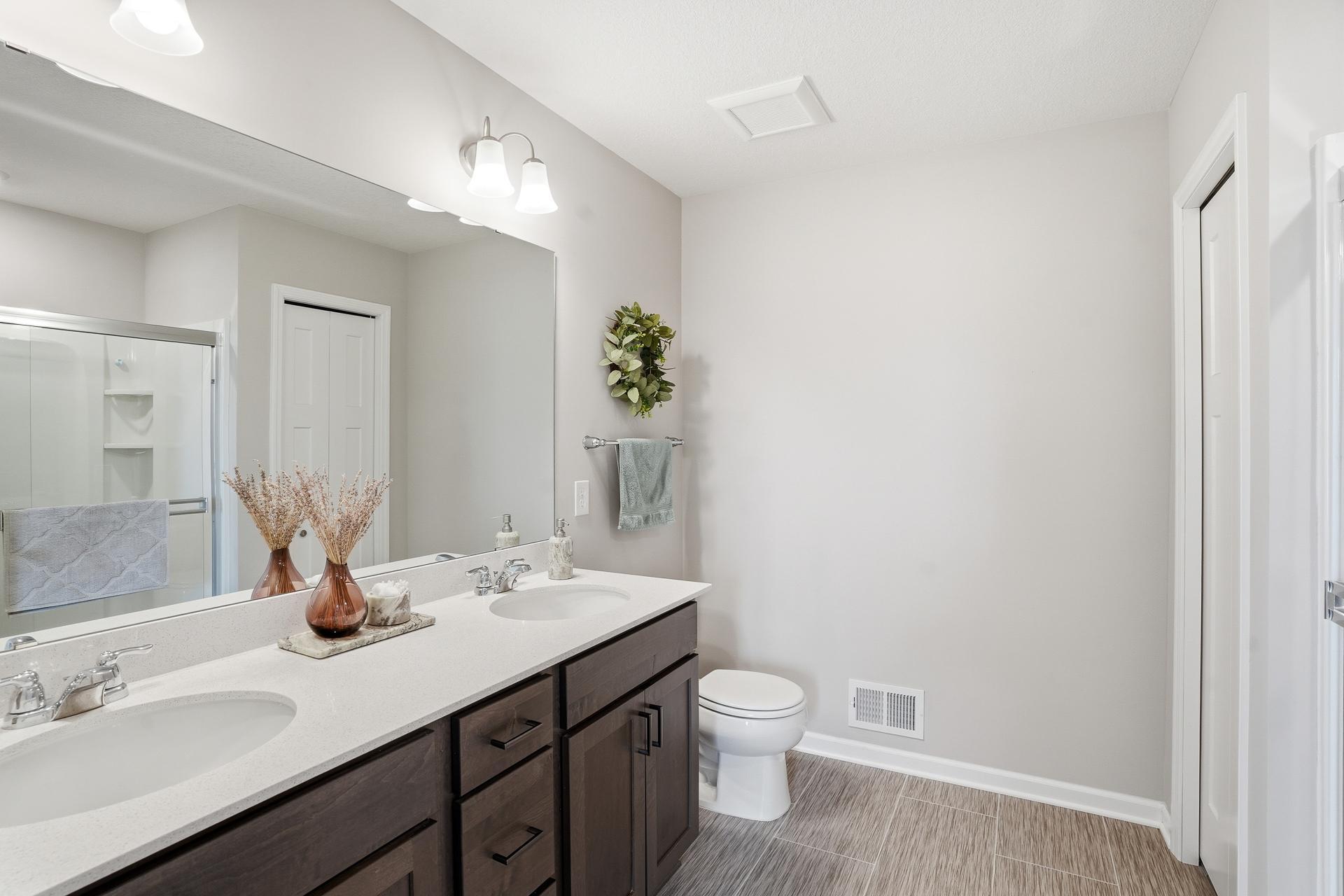Primary bath with dual vanities