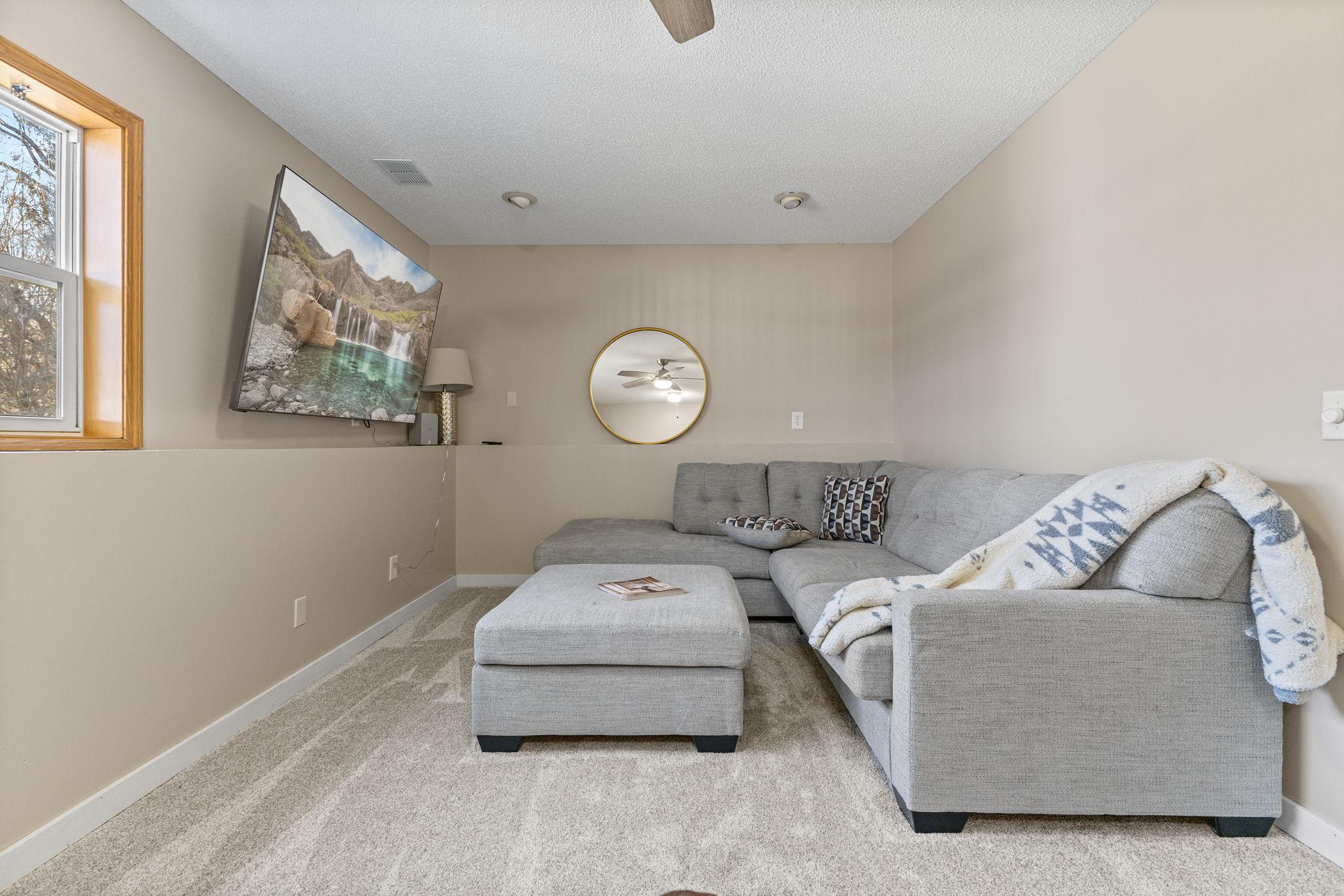 This lower level is bright with lookout windows.