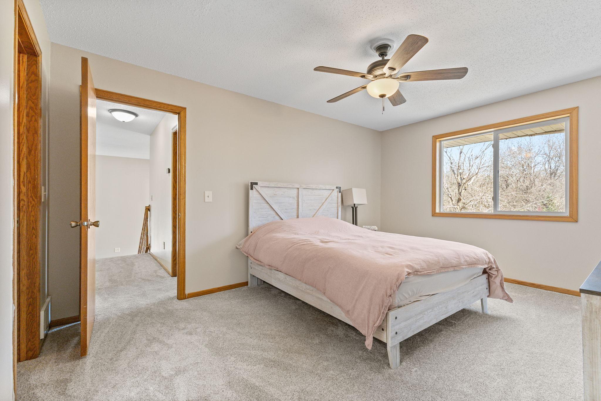 Complete with neutral tones, abundant natural light and a ceiling fan for added comfort!