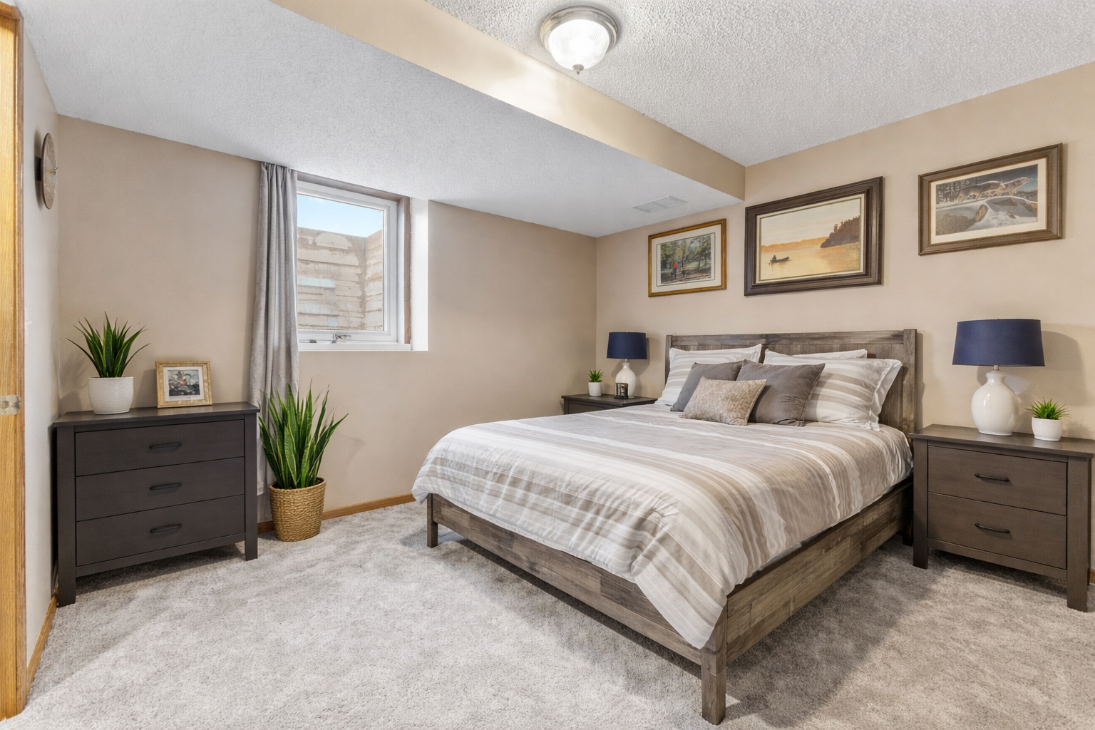 The fourth bedroom, located on the fourth level, offers a flexible space perfect for a guest retreat, home gym, office, and more.