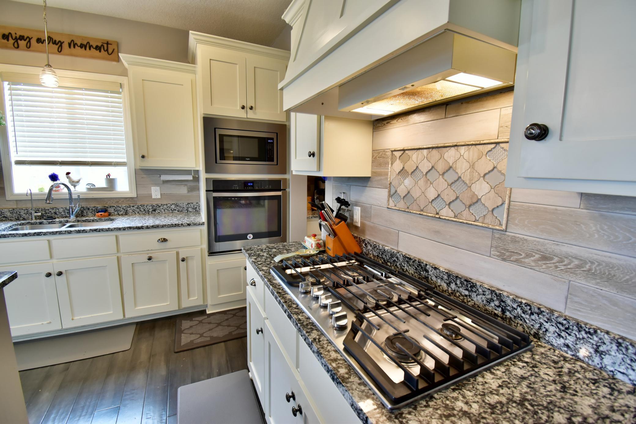 Chefs Kitchen with Gas Stove and Double Ovens
