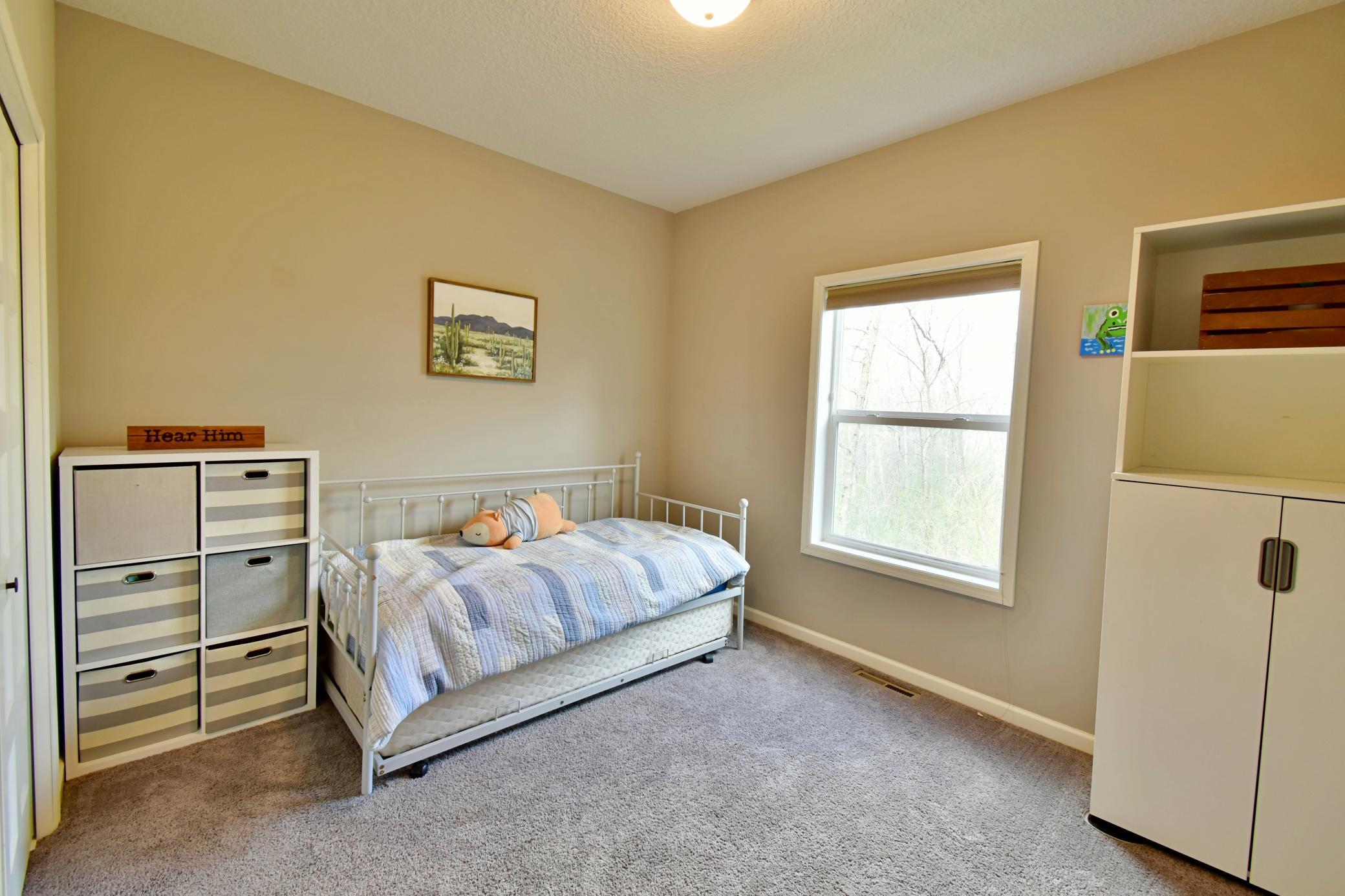 Main Floor Bedroom 1 of 8