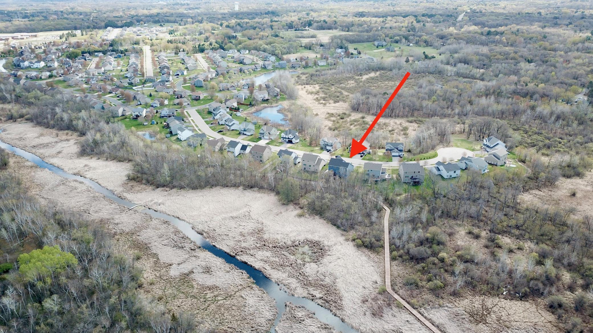 Wooden Boardwalk Walking Paths Overlook Creek and Wetlands