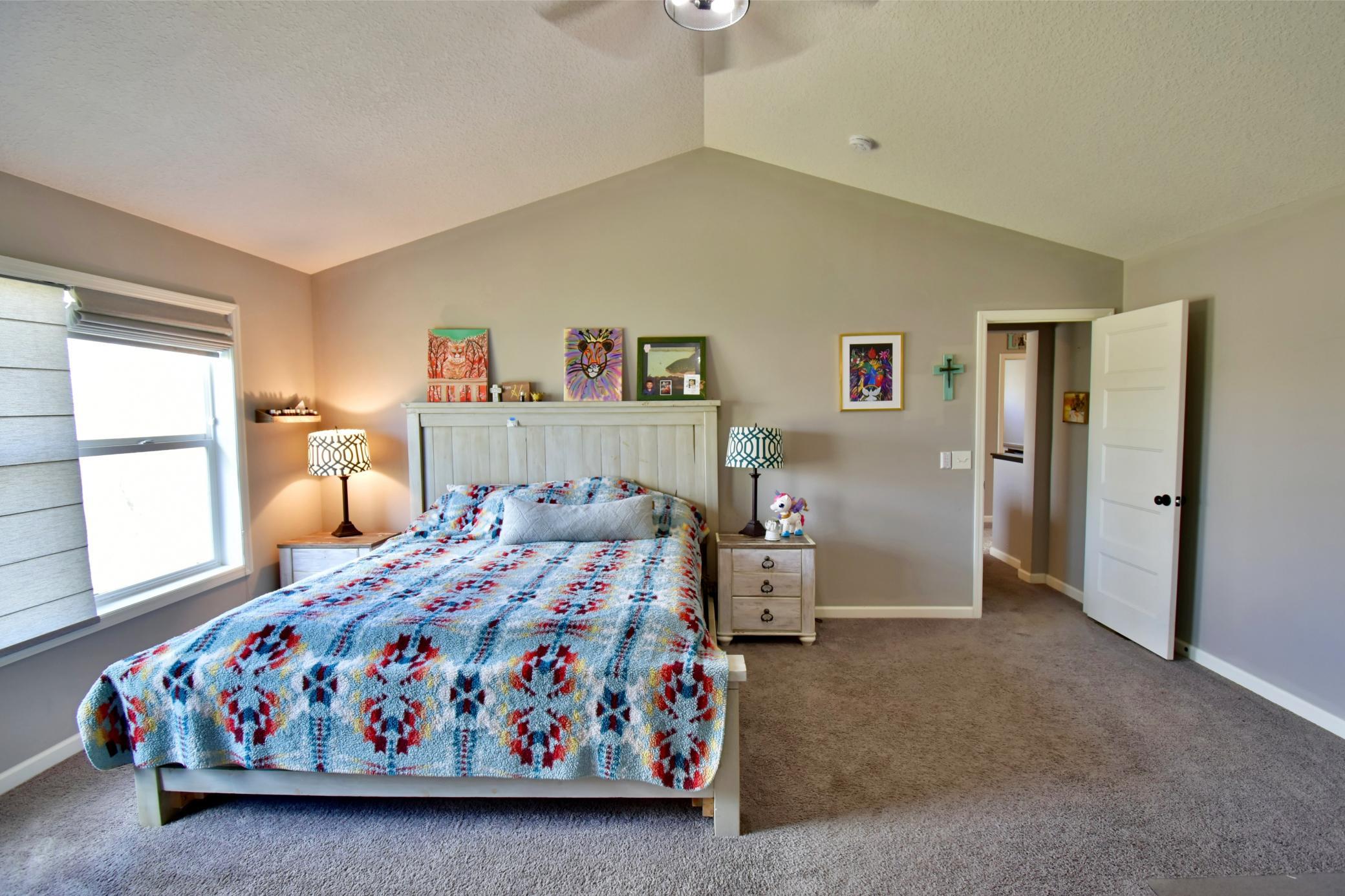 Vaulted Ceilings in Primary Bedroom 5 or 8 with ensuite full bath, walk-in closets