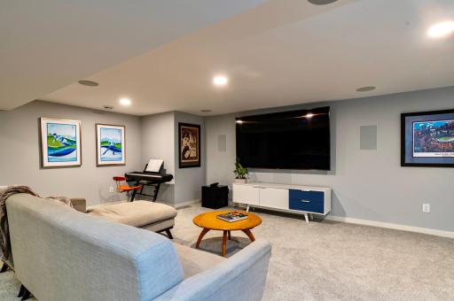 There is room for the whole family in the lower level media room.