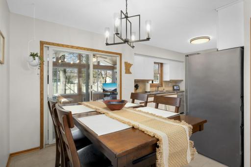 Dining room opens to 3 season sunroom (4 season with the built-in space heaters!)
