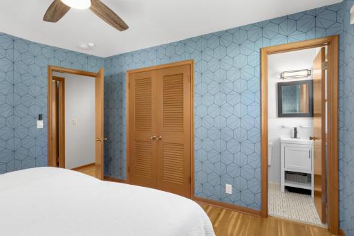 Primary features walk-in closet and en suite bath.