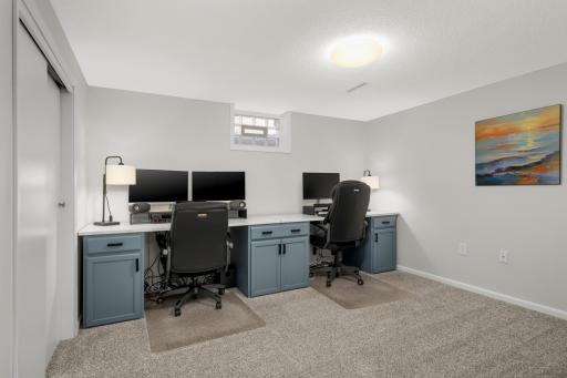It's not all fun and games...work awaits at your home office. Potential 4th bedroom if you add an egress window.