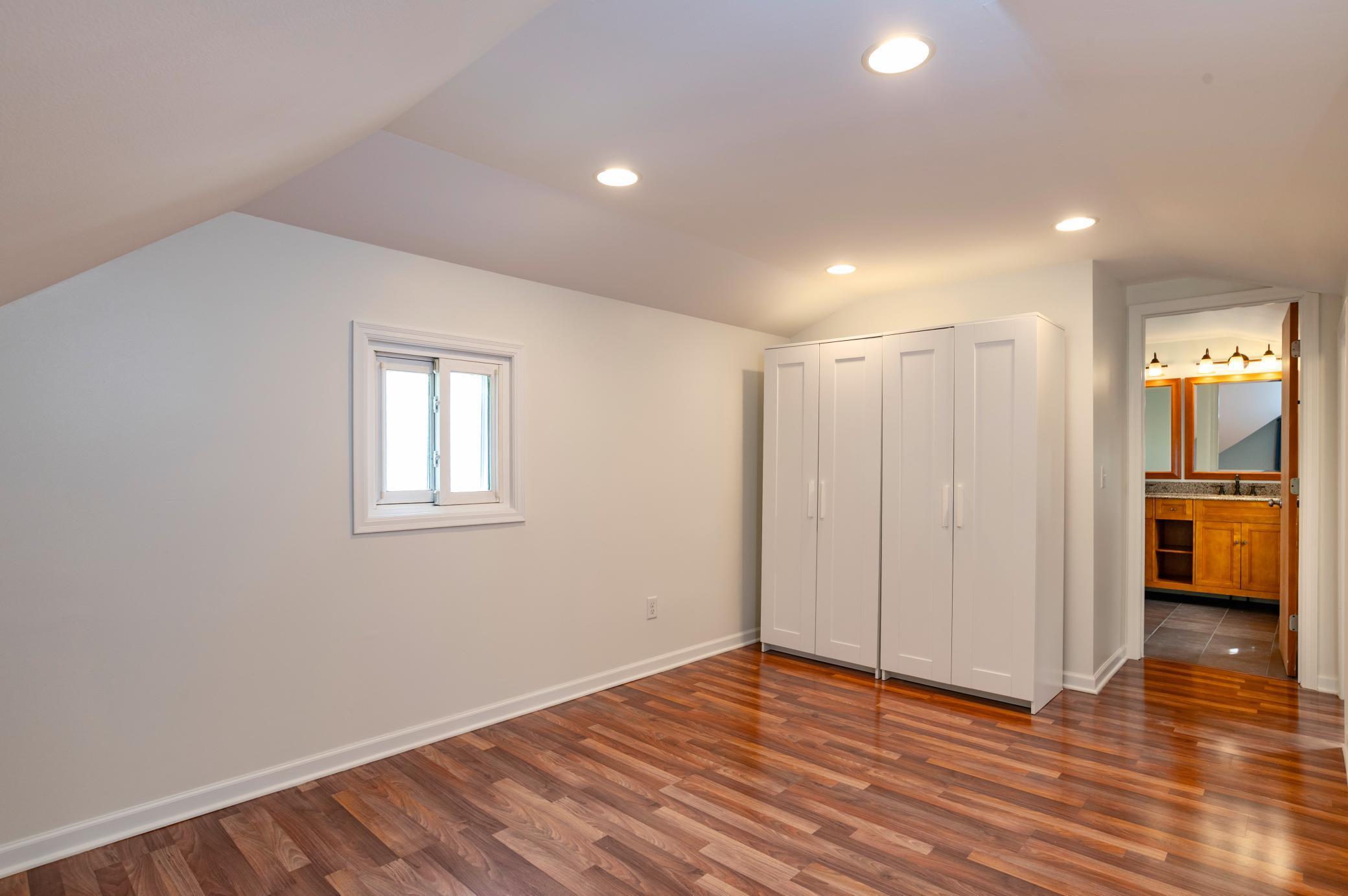 The huge primary bedroom features a private bathroom!