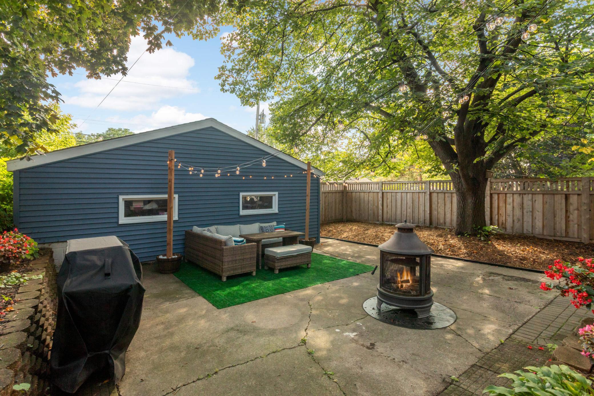The multiple spaces in the back yard are great for hosting parties or quiet dinners at home!