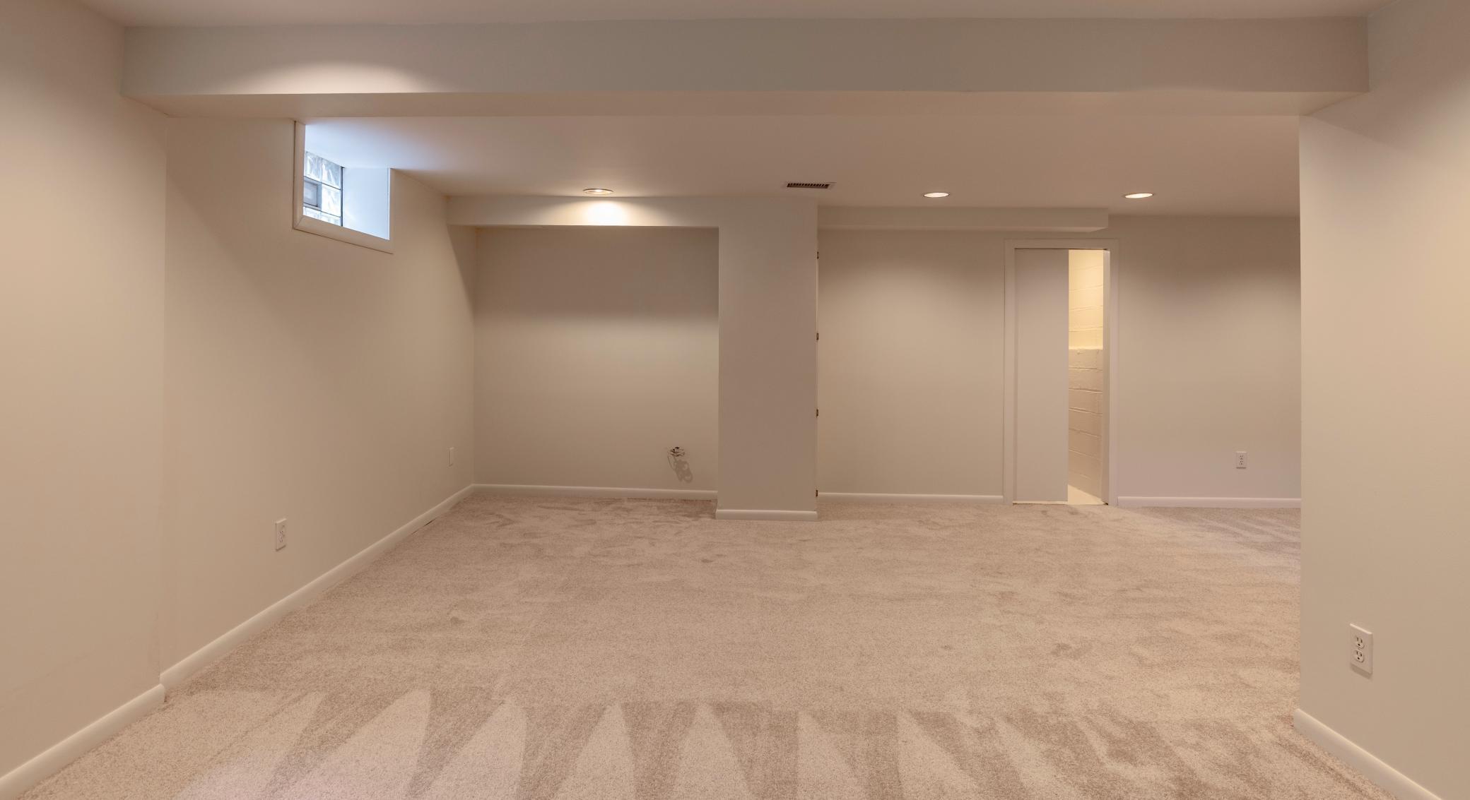 Freshly painted and brand new carpet in the finished lower level.