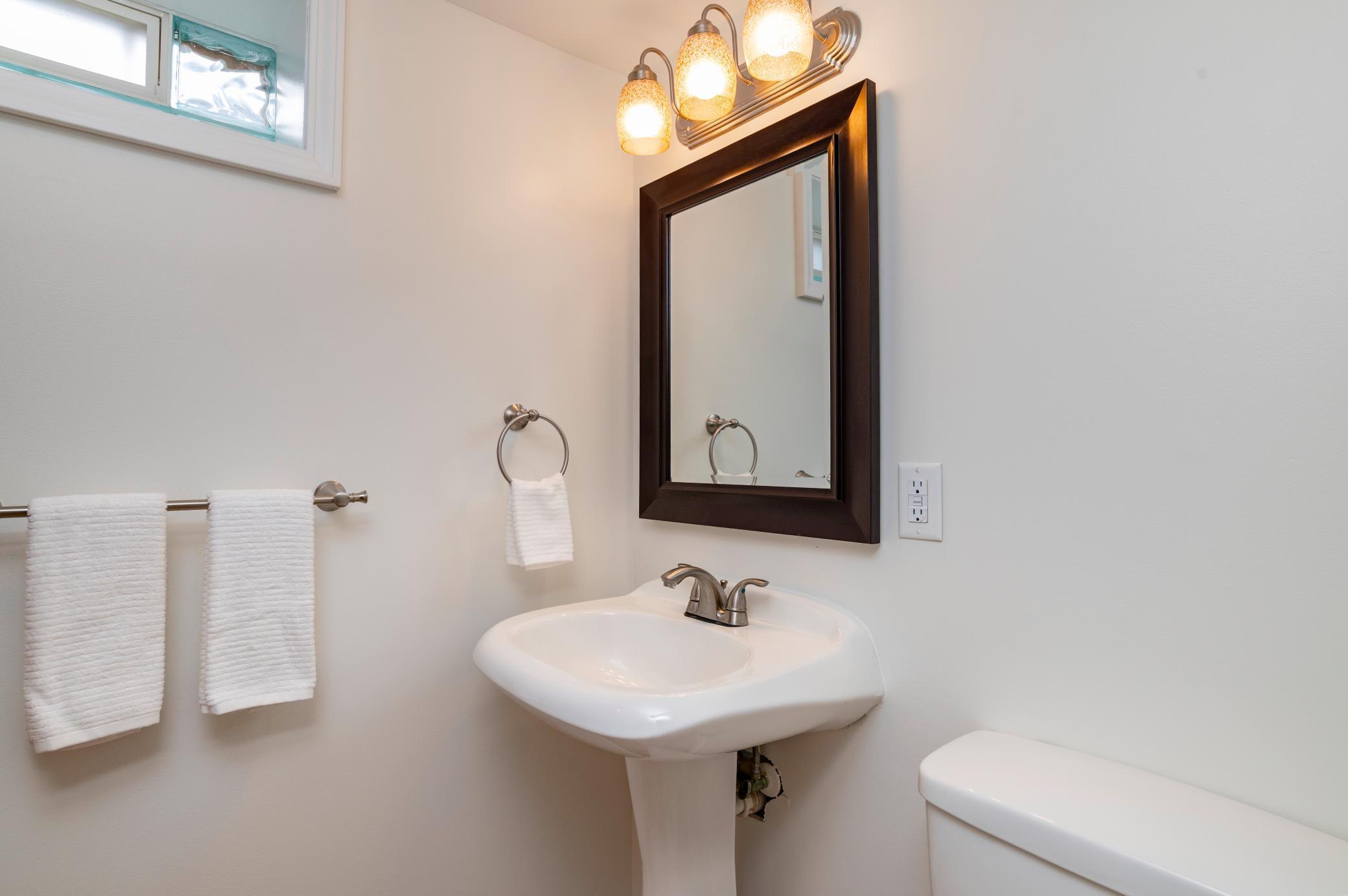 Lower level three quarter bathroom with walk-in shower