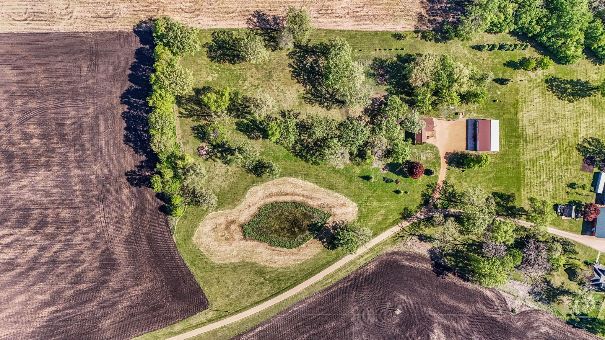 7.62 Acres with 60 x 36 shed and pond