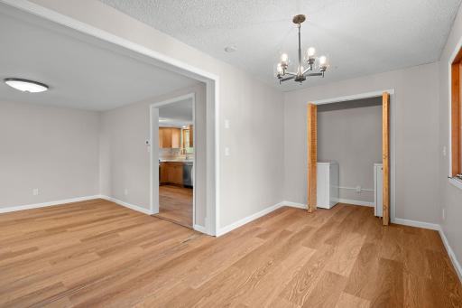 Front room is the perfect office with a new laundry closet. This could also be made into a main level bedroom.
