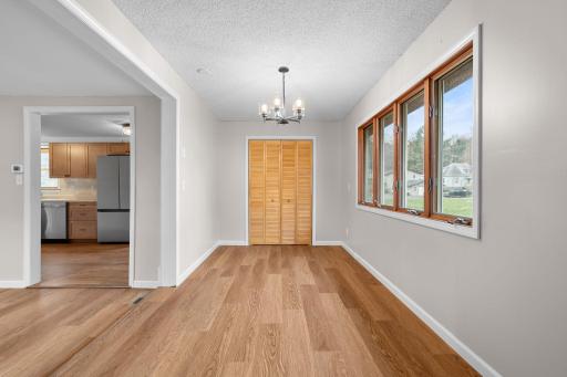 Front room is the perfect office with a new laundry closet. This could also be made into a main level bedroom.