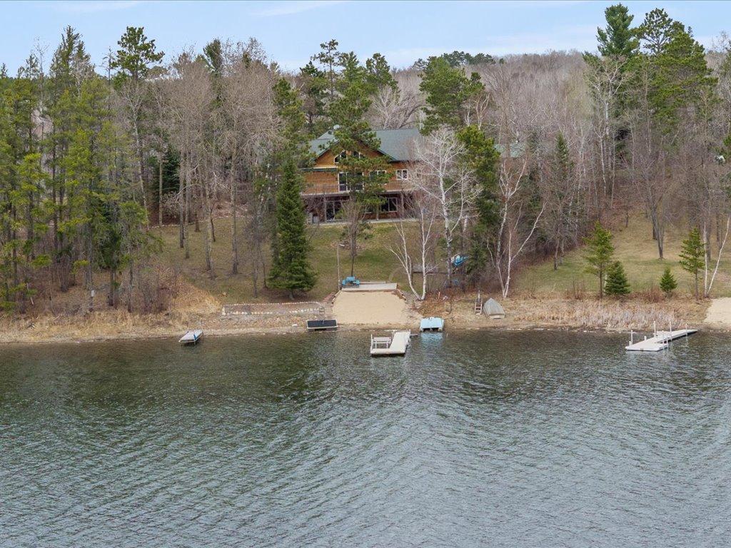 Pickeral Lake homes offers the lakefront charm, facing south and sand beach. Everything you are looking for in the Northwoods!