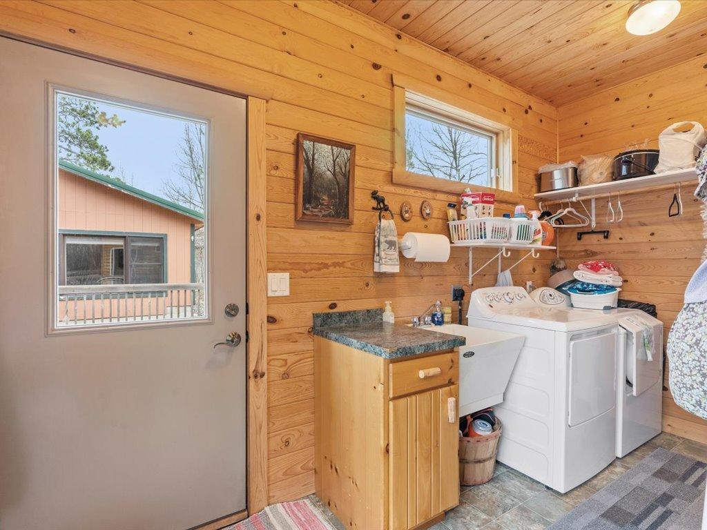 Entrance from the side off of deck brings you into closet and wash room.