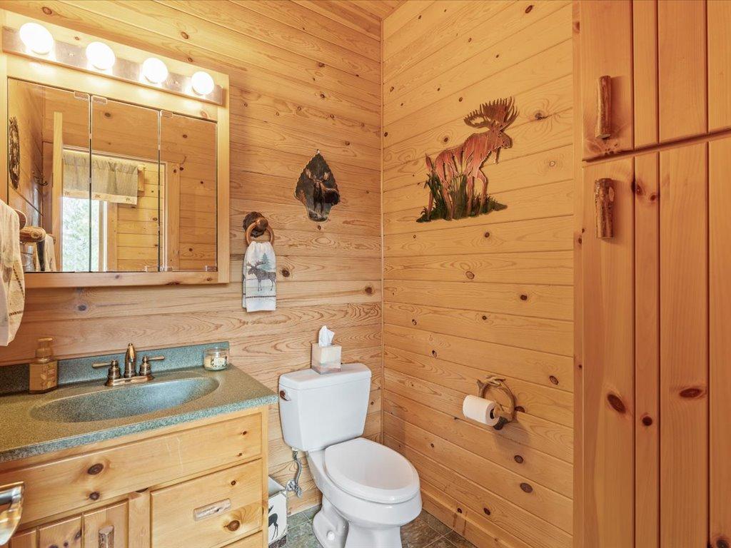 The half bath on the main level is next to laundry room.