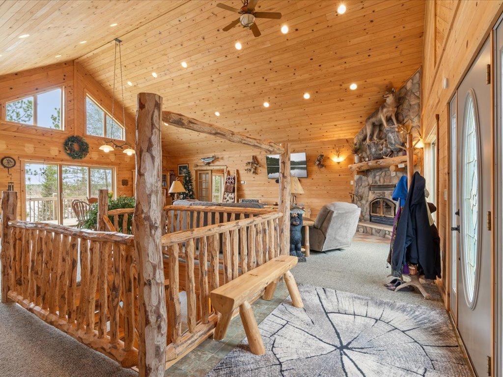 Entering the main level entrance into the grand living room and dining area.