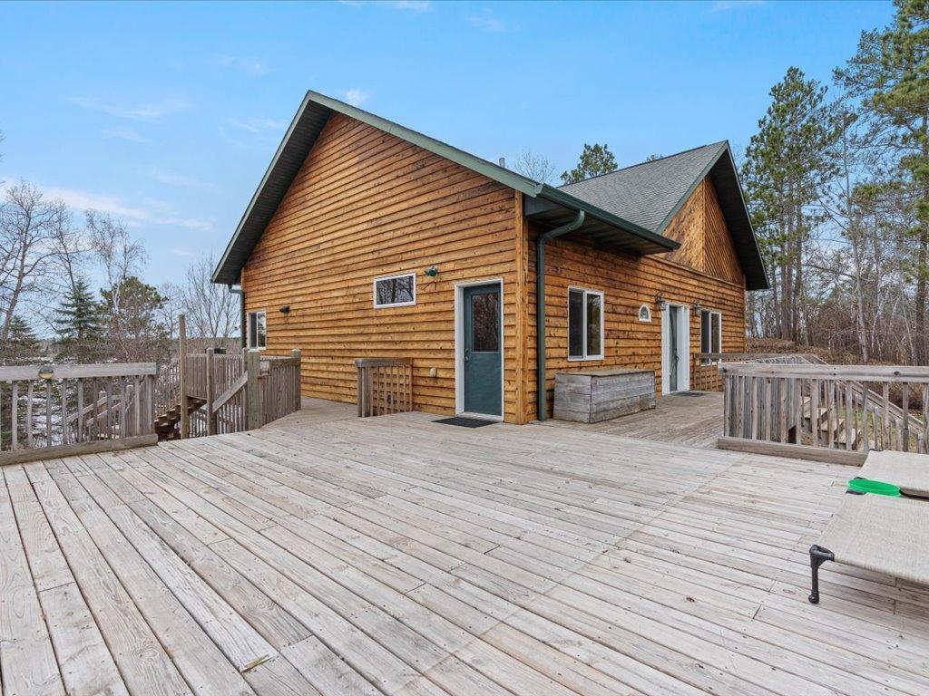 Large deck between home and bunk house.