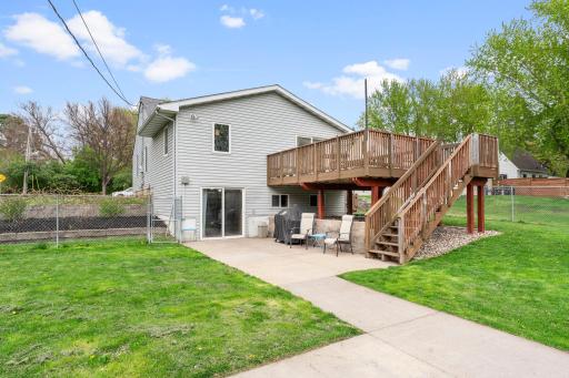 Backyard features a lovely walkout to the patio area and a lovely sized deck with stairs