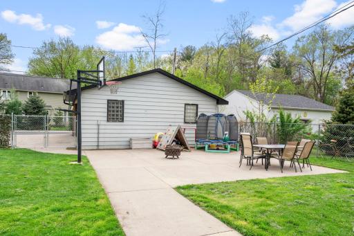 Patio/play area off of the detached garage. Perfect for summer campfires!