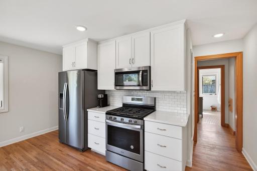 Ample cabinet storage plus additional pantry space nearby.