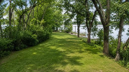 This one of a kind property offers exceptional privacy, mature trees, beach and firepit area, and endless shoreline to explore.