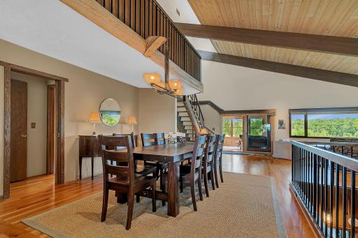 Rich hardwood floors and natural wood finishes enhance the home's timeless character.