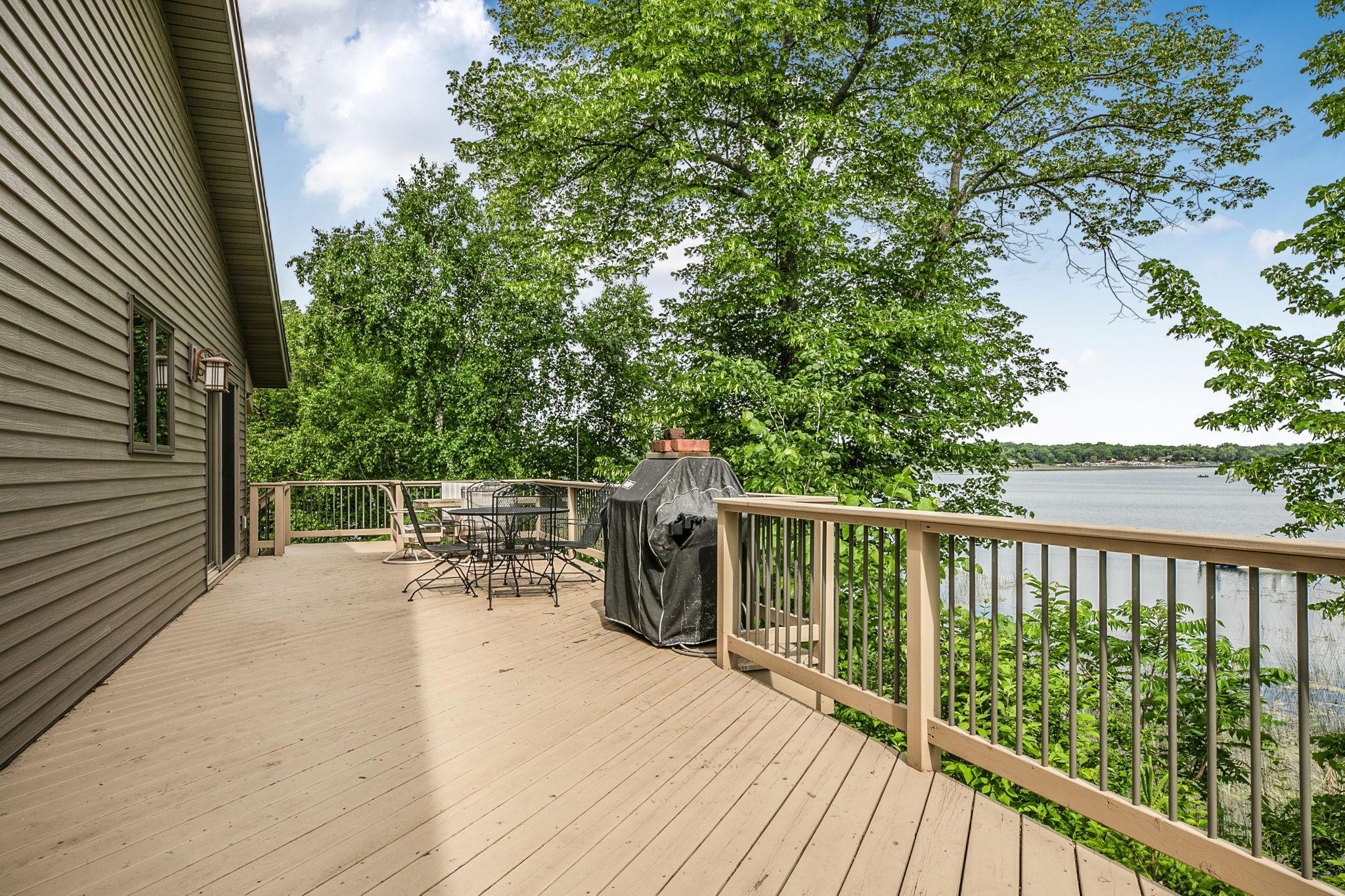 Enjoy front row views of Clearwater Lake from this generous deck, conveniently accessed through the dining room and perfectly positioned to take in the peaceful surroundings.