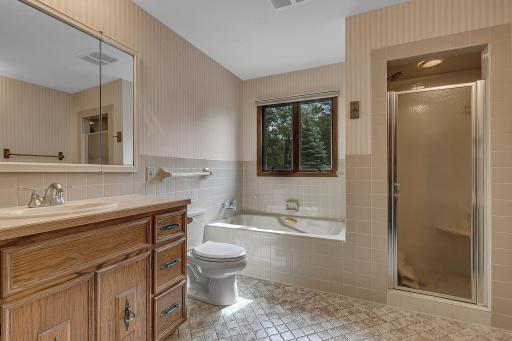 Conveniently located between the main level bedrooms and just off the dining area for easy access.
