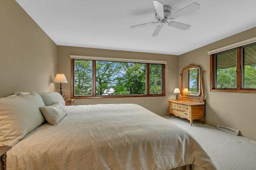 Tucked away on the upper level, the fourth bedroom provides privacy, generous space, and a relaxing atmosphere for family or guests.