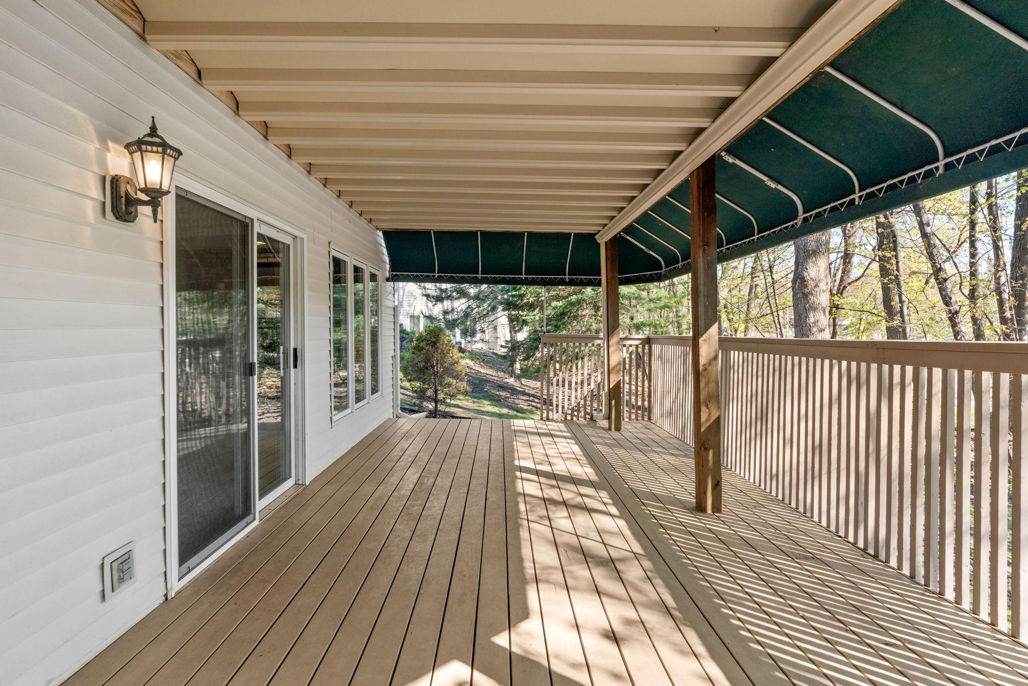 Step outside to your lower level covered deck which is great for entertaining.