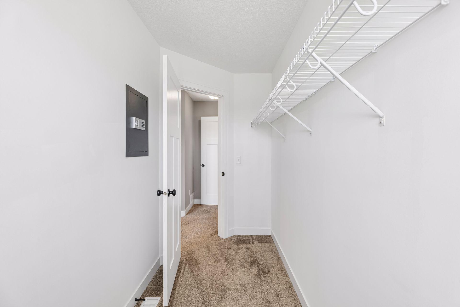 Primary walk in closet complete with built in Safe!