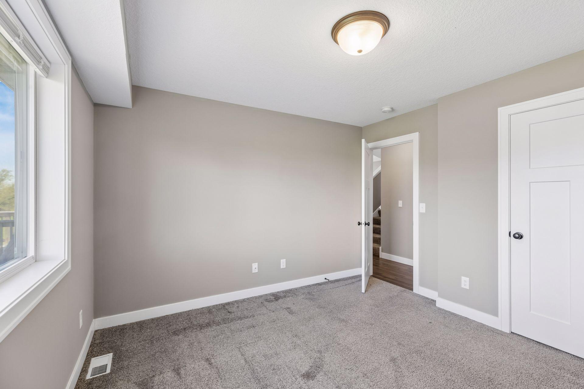 Bedroom 1 of 2 on the main level feature nice size closets.