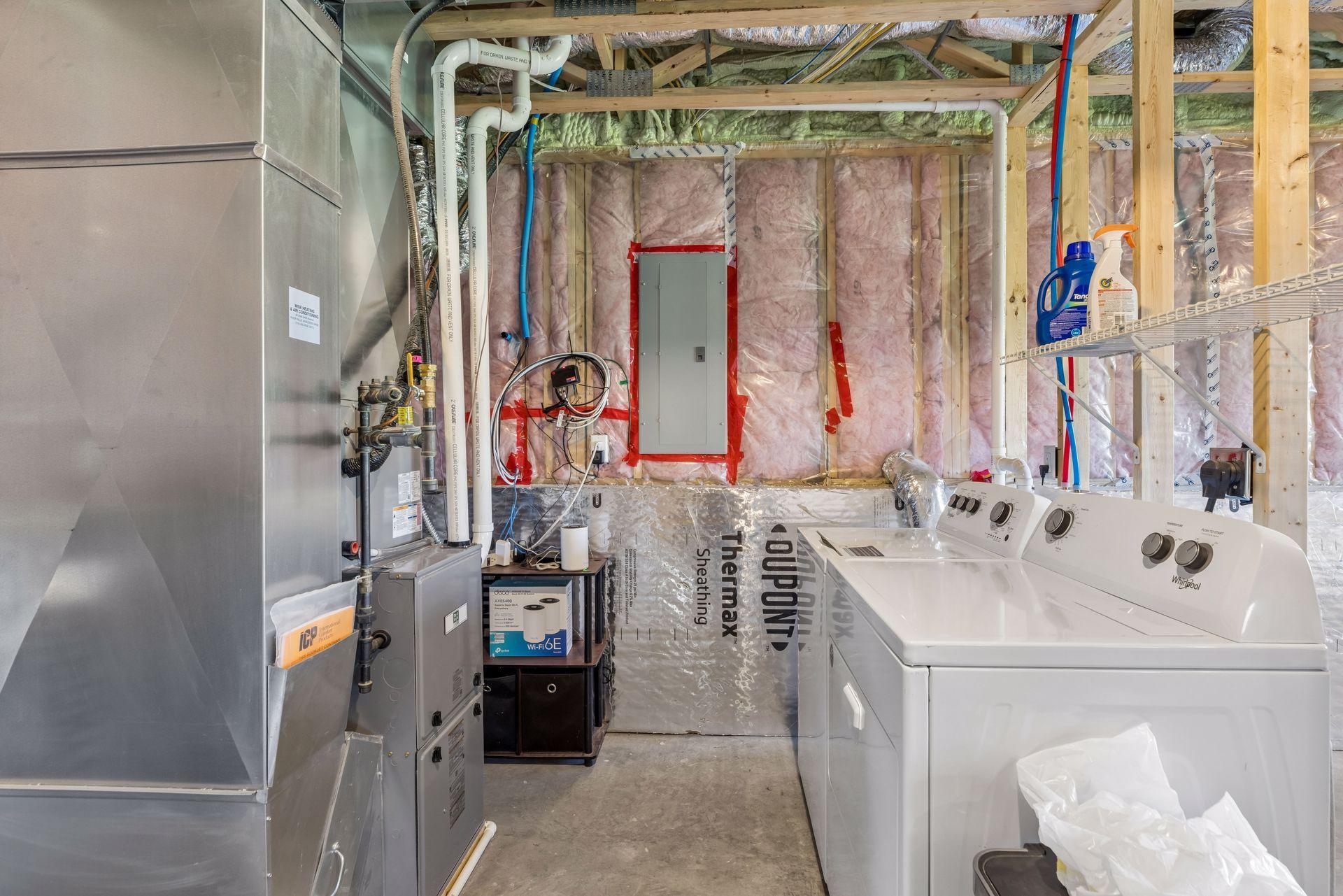Lower level laundry and utility area.