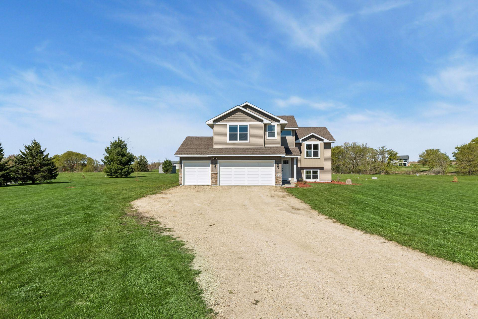 2020 built, this setting includes plenty of space for gardens, yard fun or whatever you choose. You'll appreciate the trees that have been planted which include honeycrisp apple trees!