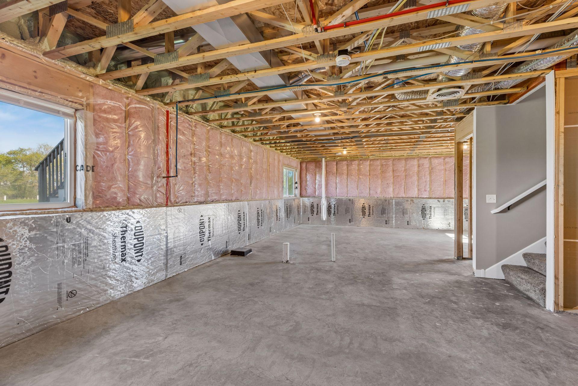 Unfinished lower level ready for your finishing touch. Bathroom is roughed in and the original plans show for an additional bedroom, bath and a spacious family room. Although the possibilities are endless.