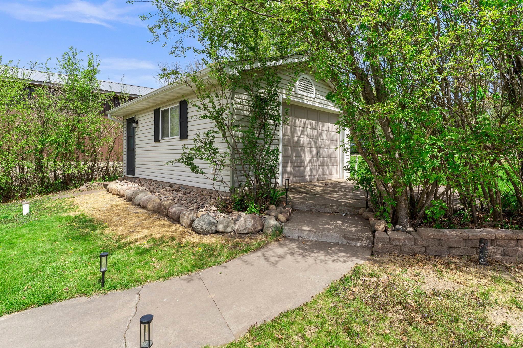 The property includes an oversized 1 car garage for storage, summer toys or your car!