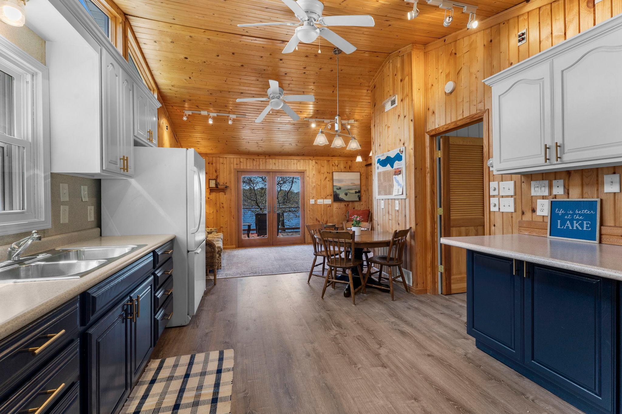 The spacious kitchen boasts additional counter space and storage and flows nicely to the family room area.