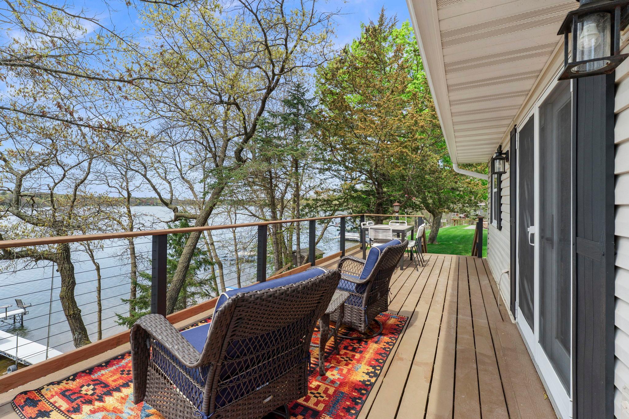 Relax and enjoy this outdoor space on the first deck.