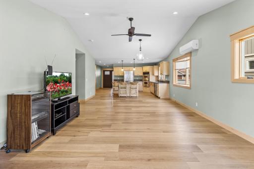 The vaulted ceilings, many windows, and open floorplan give this home a bright and open feel.