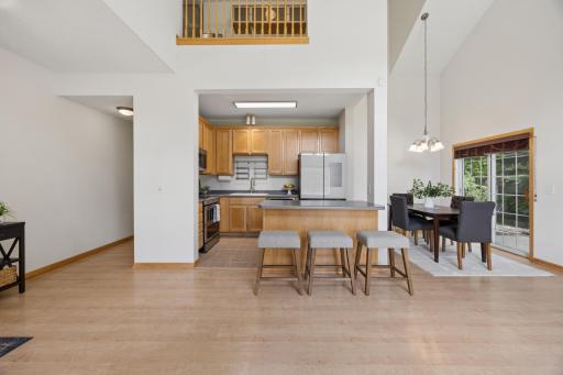 Vaulted ceiling is open to the loft office
