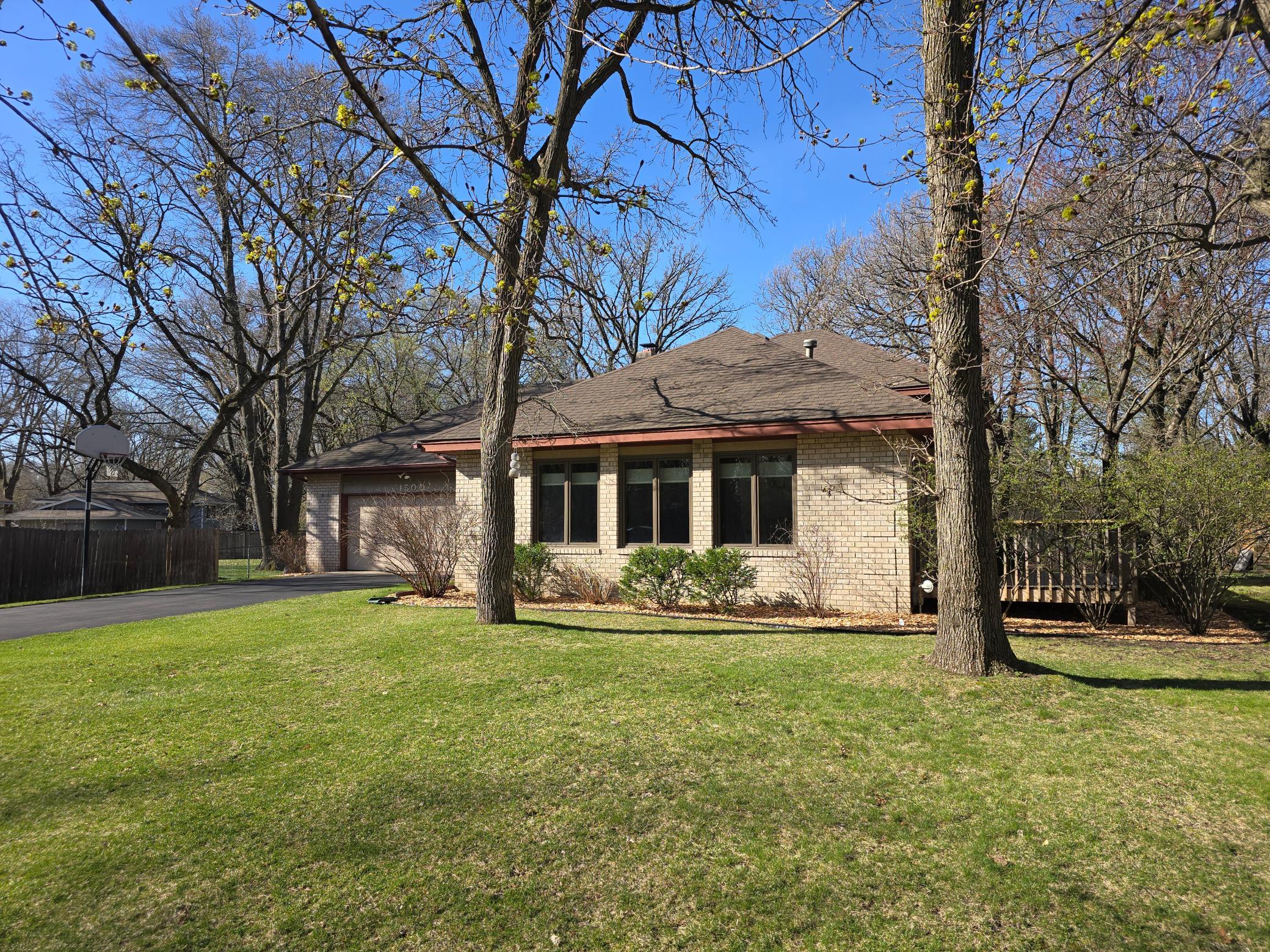 A classic brick-front home with timeless curb appeal, featuring rich masonry that adds texture, warmth, and durability.