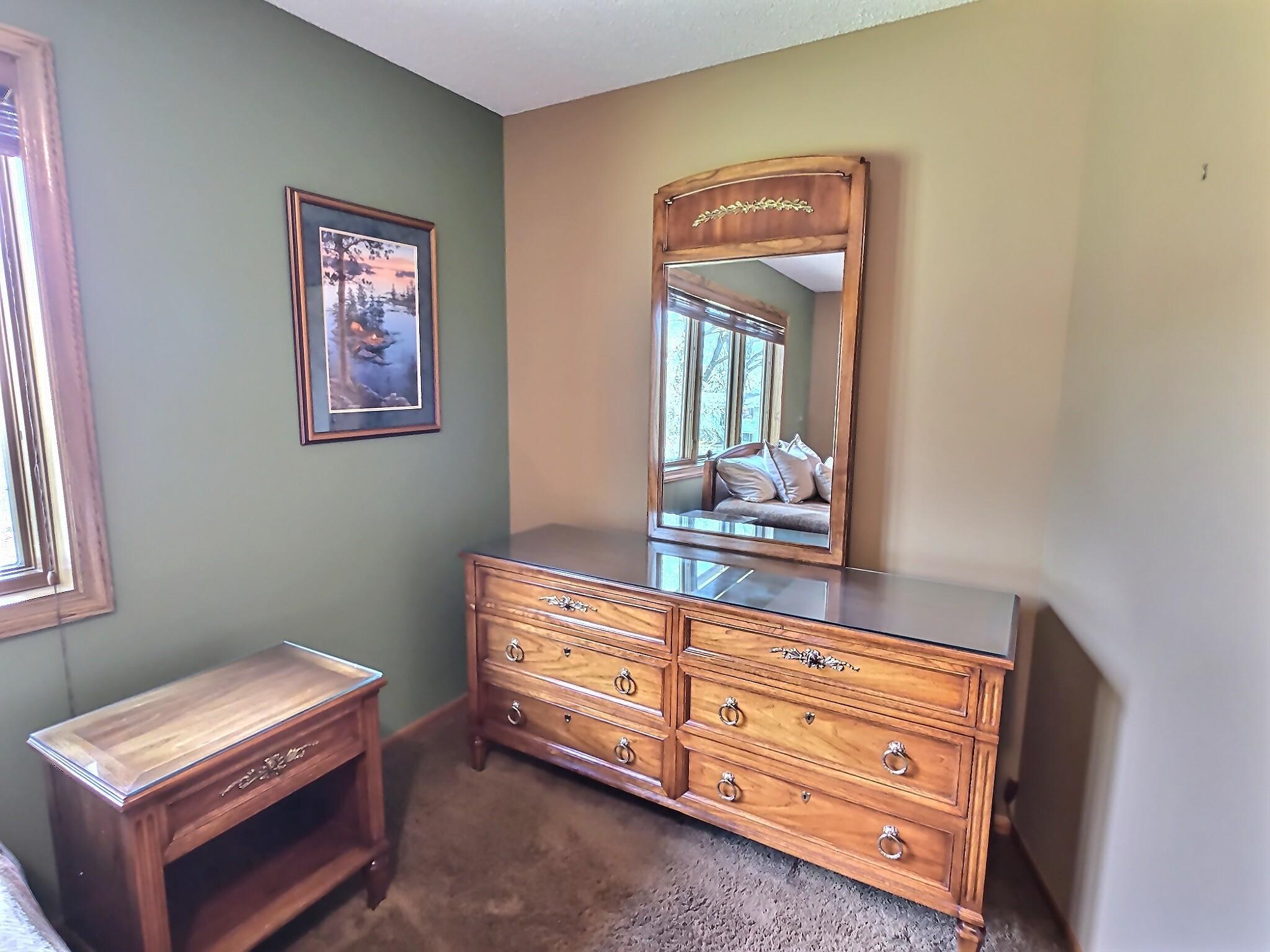 Ample space in this primary for an additional dresser, sofa, chair, bookshelf, and more.