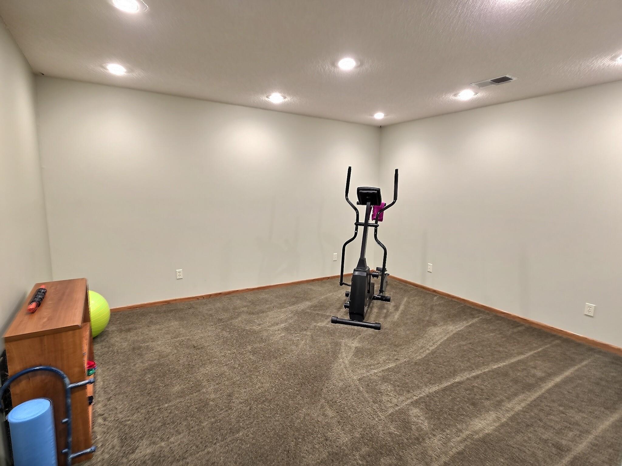 The lowest level adds incredible versatility with abundant storage, multiple closets, and space for hobbies, a home gym, or a media room.