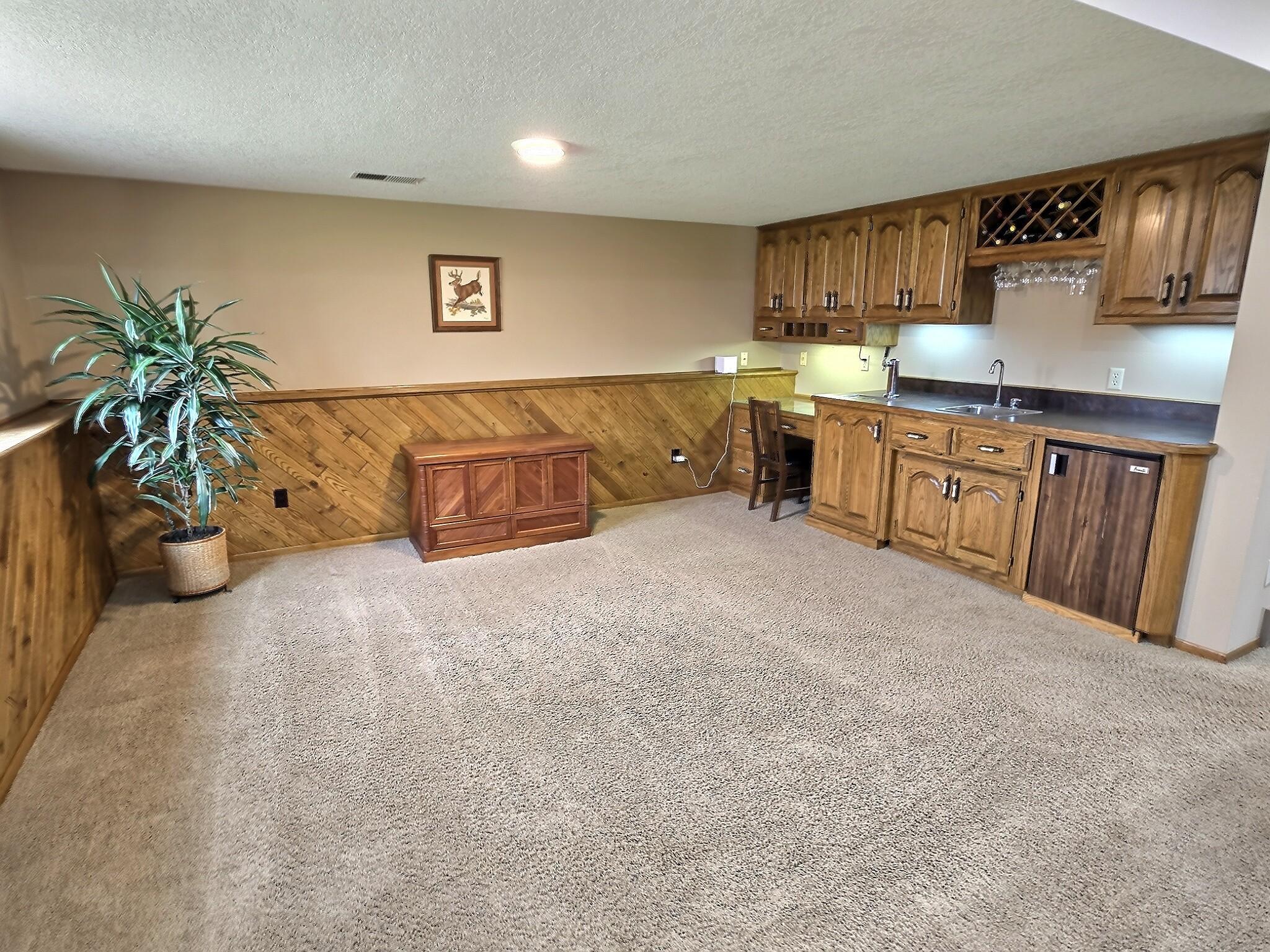 The extra space could be used for many things, not limited to: an at-home office, playroom, reading nook, pool table, entertaining space, and more.